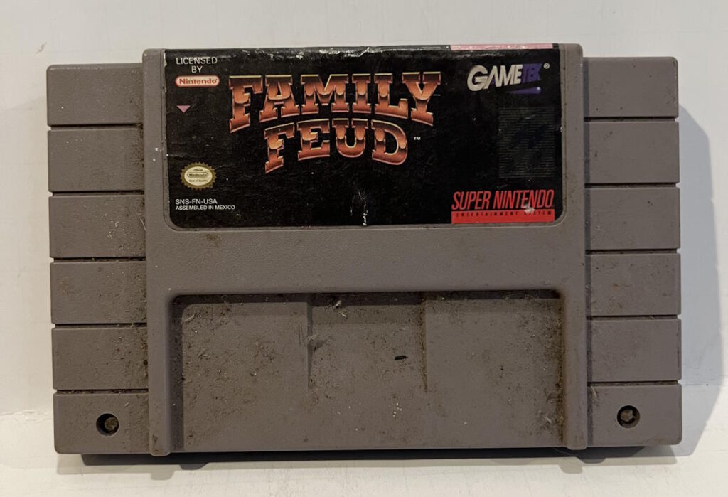 A very dirty copy of Family Feud on the Super Nintendo