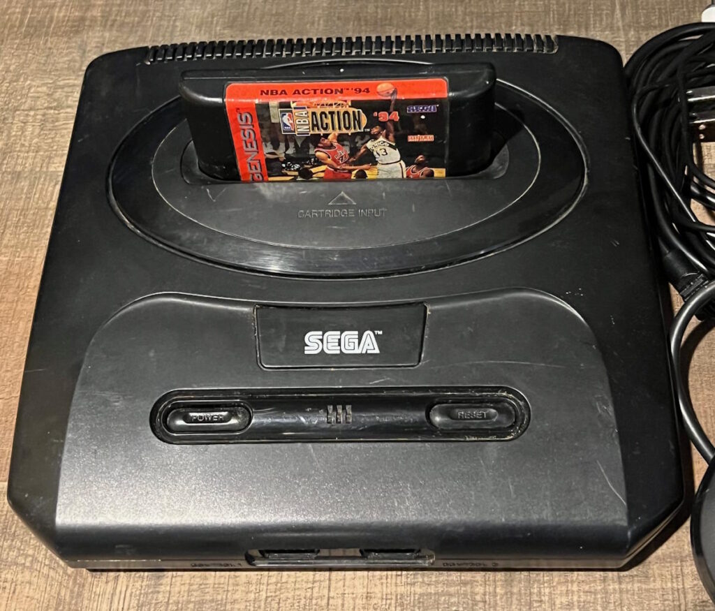 sega genesis console with NBA Action 94